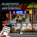 Storefront with a soft LED sign showing OPEN, controlled from a phone over Bluetooth